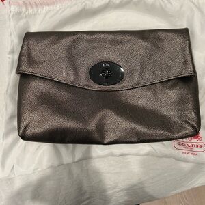 Coach Turnlock Clutch In Metallic Leather
